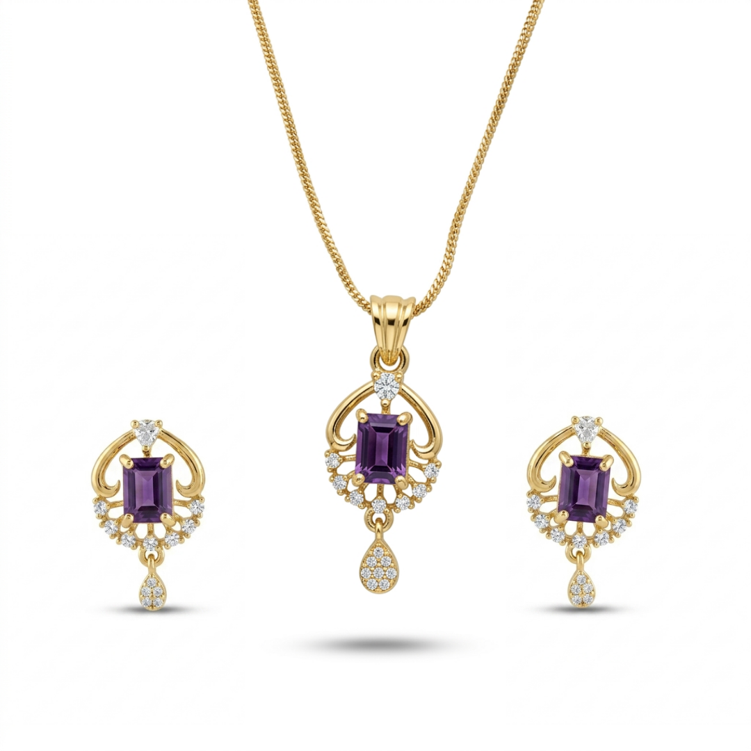 Gold jewelry set with purple gemstones on a white background