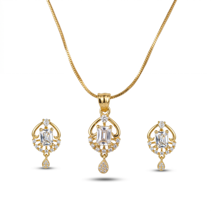 Gold necklace and earrings set on a white background