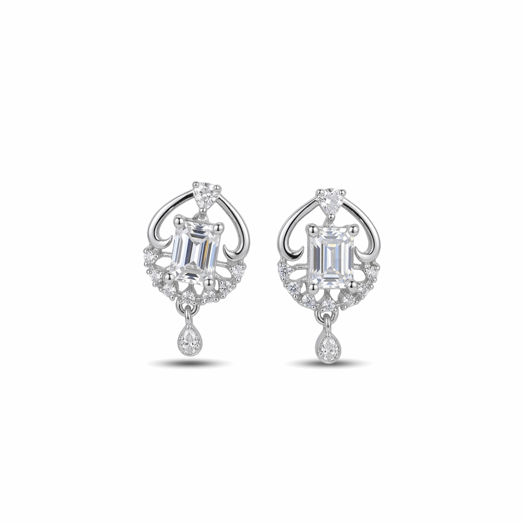 Pair of silver earrings with gemstones on a white background
