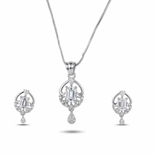 Silver jewelry set with pendant and earrings on a white background