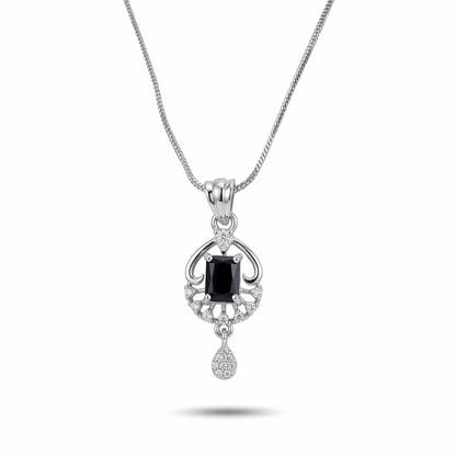 Silver pendant with a black gemstone on a white background