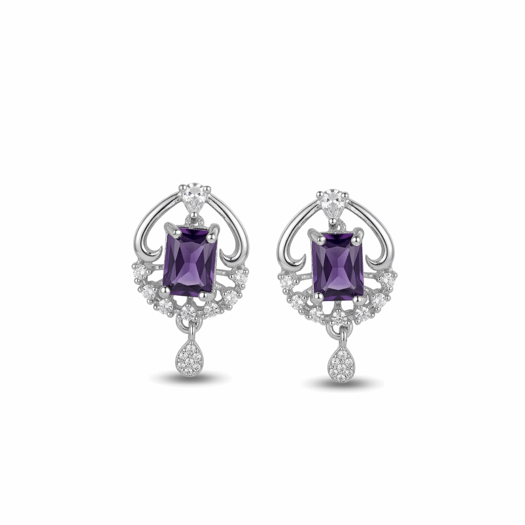 Pair of silver earrings with purple gemstones on a white background