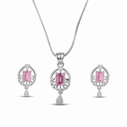 Jewelry set with pink gemstones on a white background