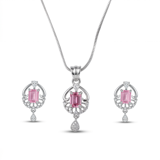 Jewelry set with pink gemstones on a white background