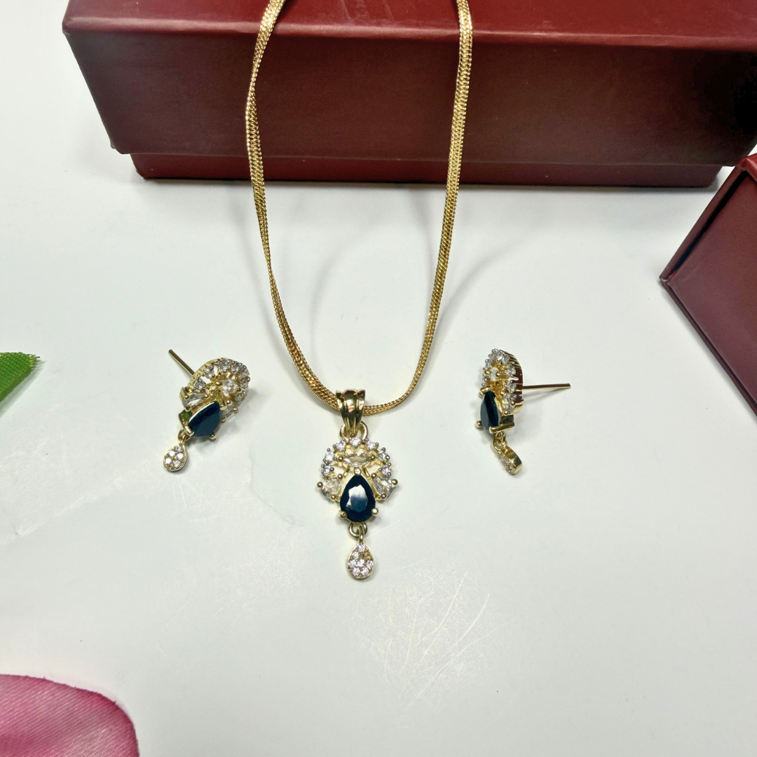 Jewelry set with necklace and earrings on a white surface