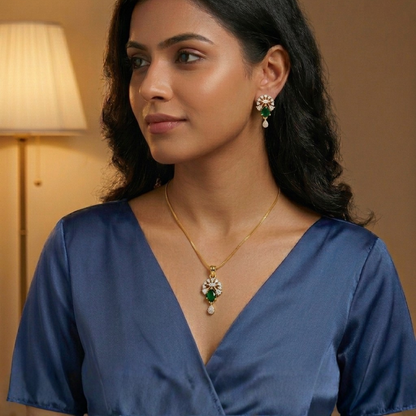 Woman wearing a necklace and earrings with a warm background