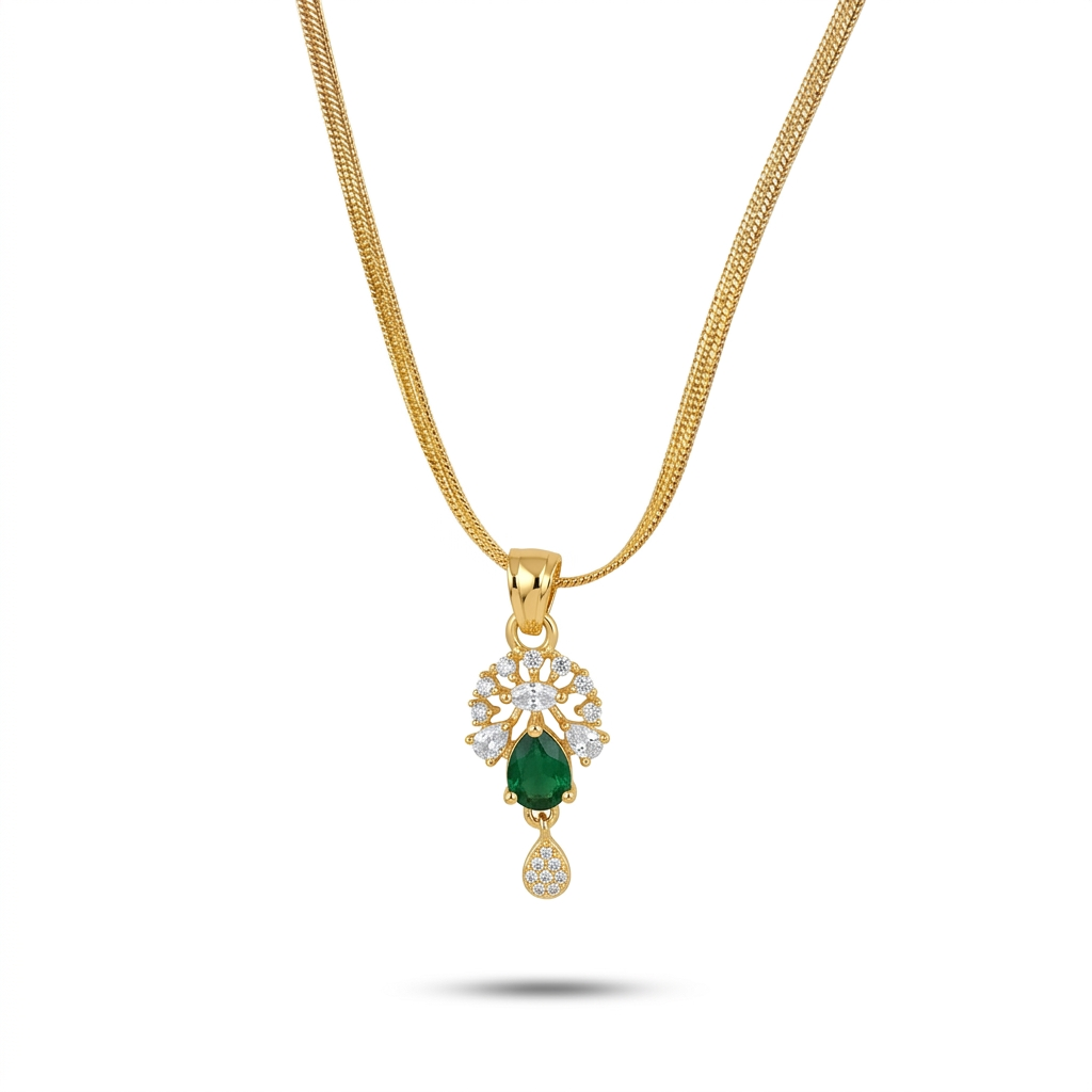 Gold necklace with a green gemstone pendant on a white background