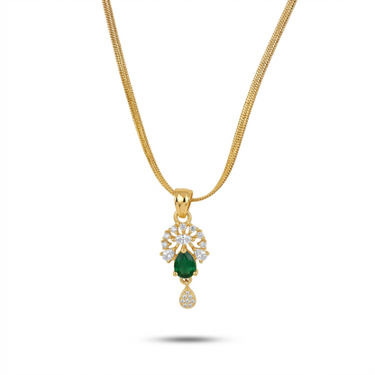 Gold necklace with a green gemstone pendant on a white background