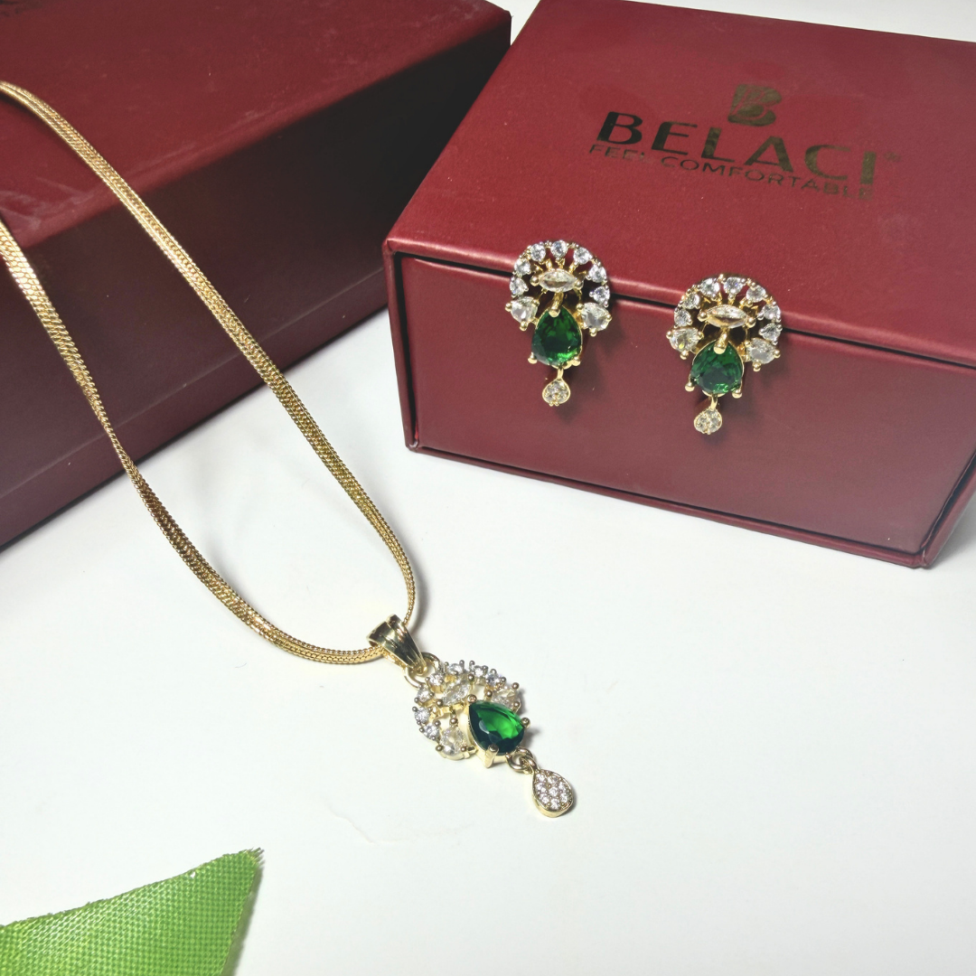 Jewelry set with necklace and earrings on a Belart branded box.