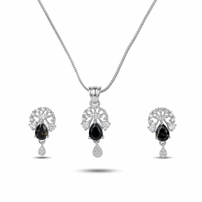 Jewelry set with black gemstones on a white background