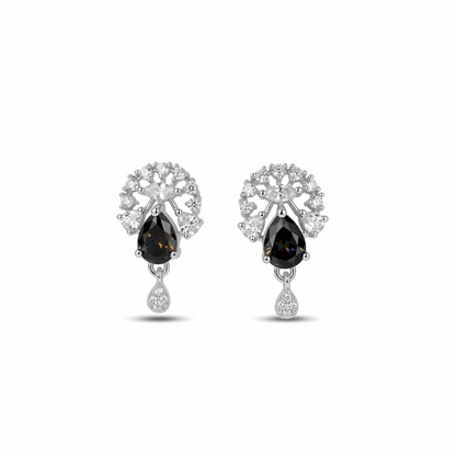 Pair of earrings with black gemstones and silver accents on a white background