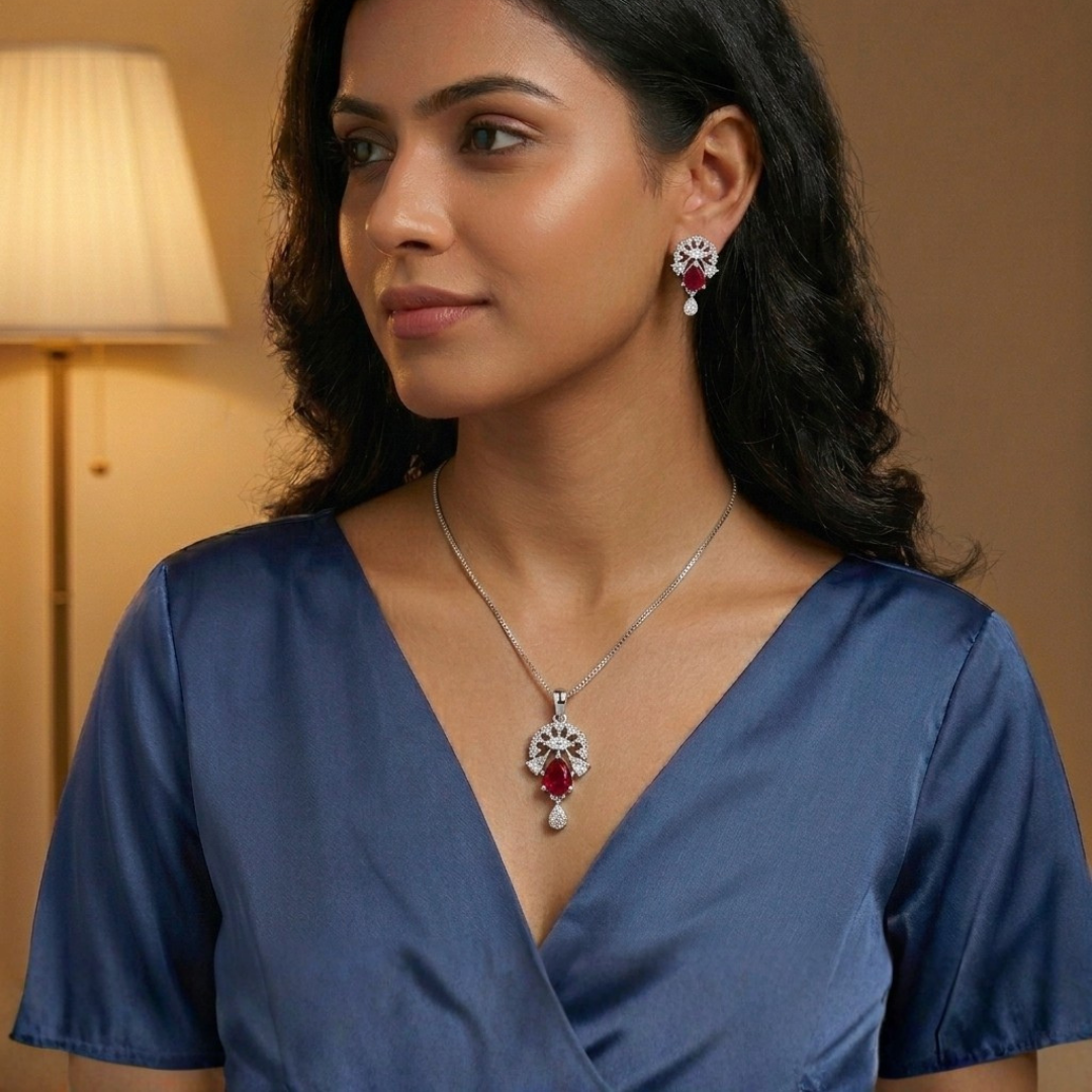 Woman wearing a necklace and earrings with a warm background