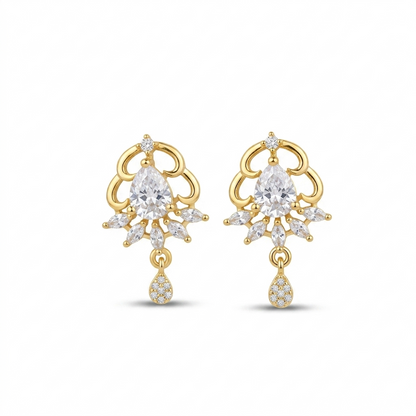 Gold earrings with clear gemstones on a white background