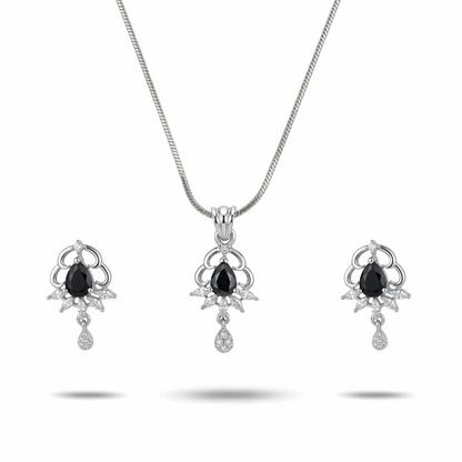 Jewelry set with necklace and earrings featuring black gemstones on a white background