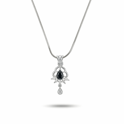 Silver necklace with a pendant featuring an black gemstone on a white background
