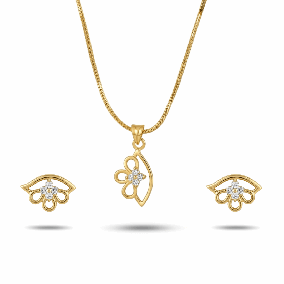 Gold necklace and earrings set on a white background