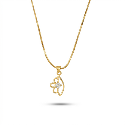 Gold necklace with a heart-shaped pendant on a white background