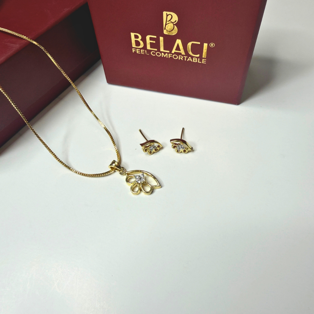 Gold necklace and earrings with BELACI branding on a white background