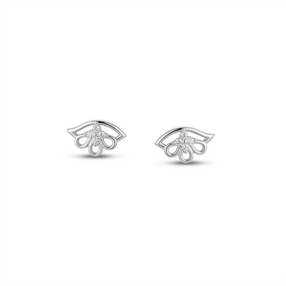 Pair of silver earrings with a diamond on a white background