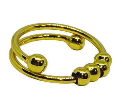 Gold Ring for Women with spherical beads on a white background