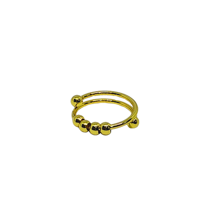 Gold Ring for Women with spherical beads on a white background