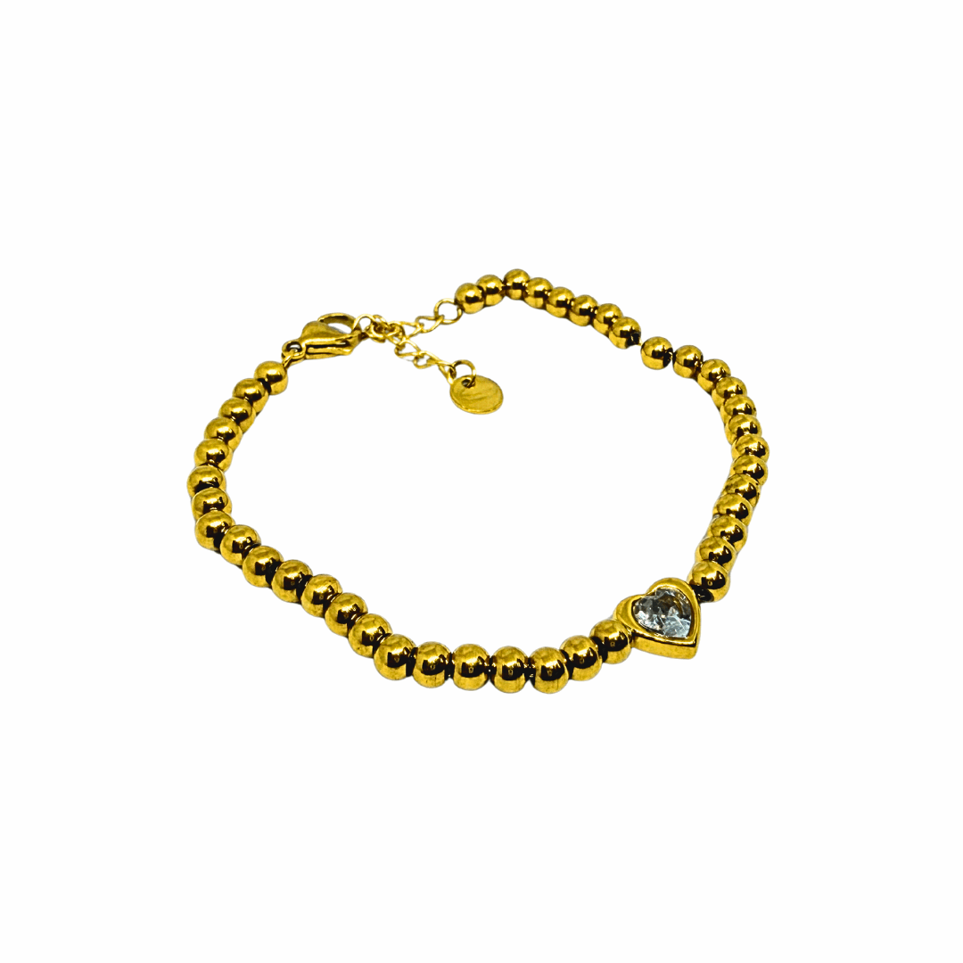 Diamond Bracelet for Women on a reflective surface with a blurred background
