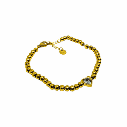 Diamond Bracelet for Women on a reflective surface with a blurred background
