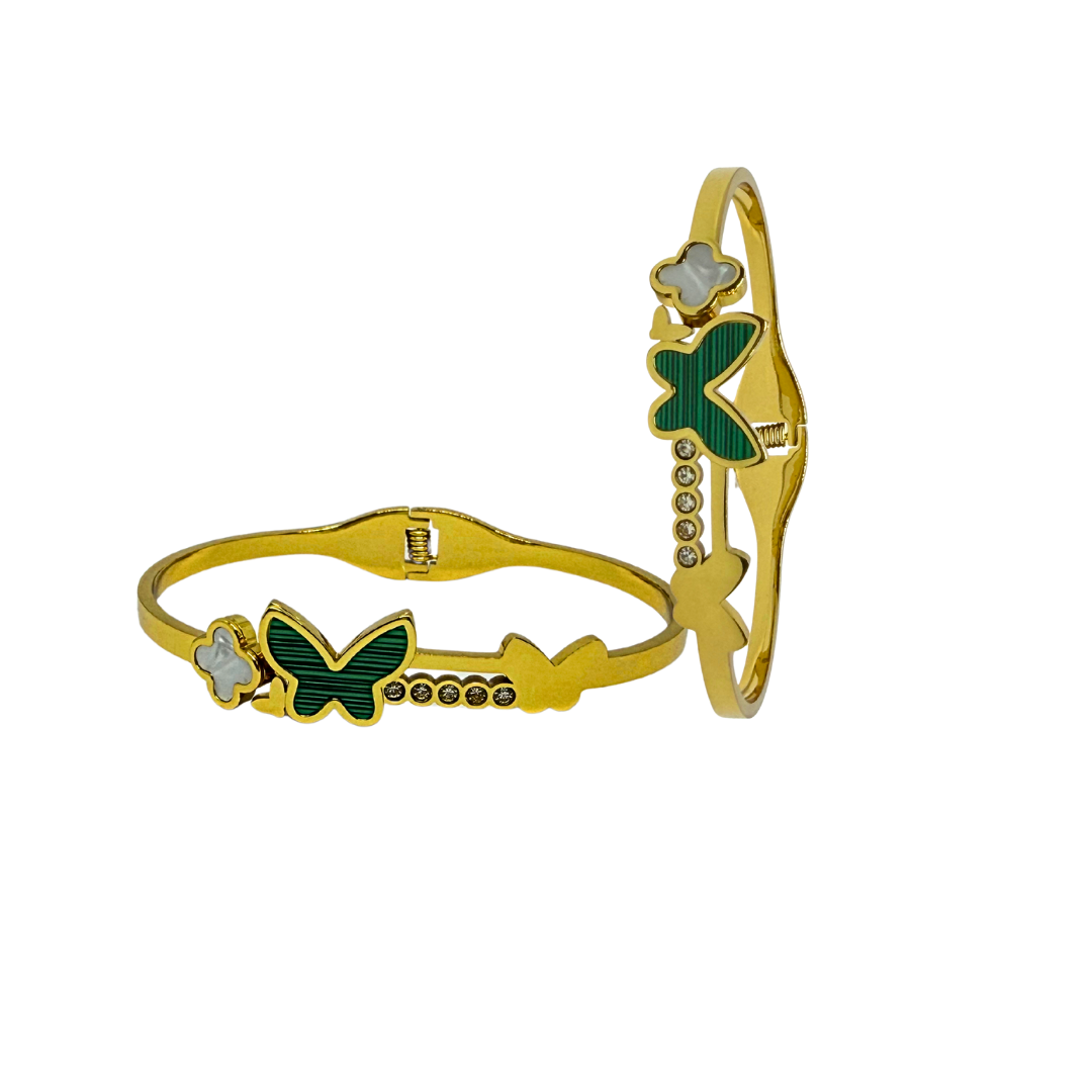 Gold Bracelet for Women with green butterfly and star designs on a white background