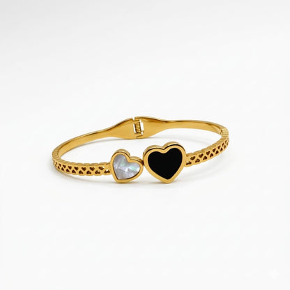 Gold Plated Bracelet for Women with heart-shaped charms on a white background
