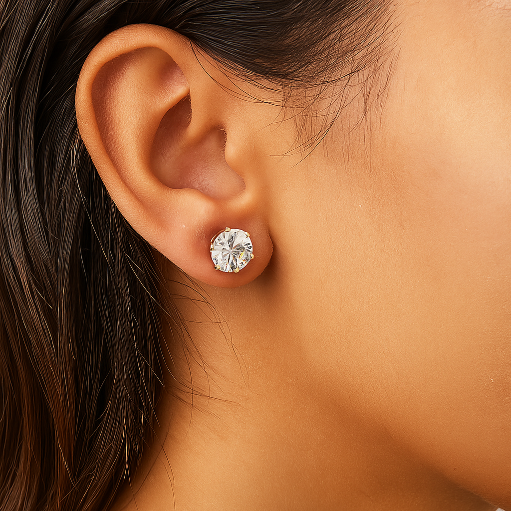 Close-up of an ear wearing a diamond stud Earrings for Women with a blurred background