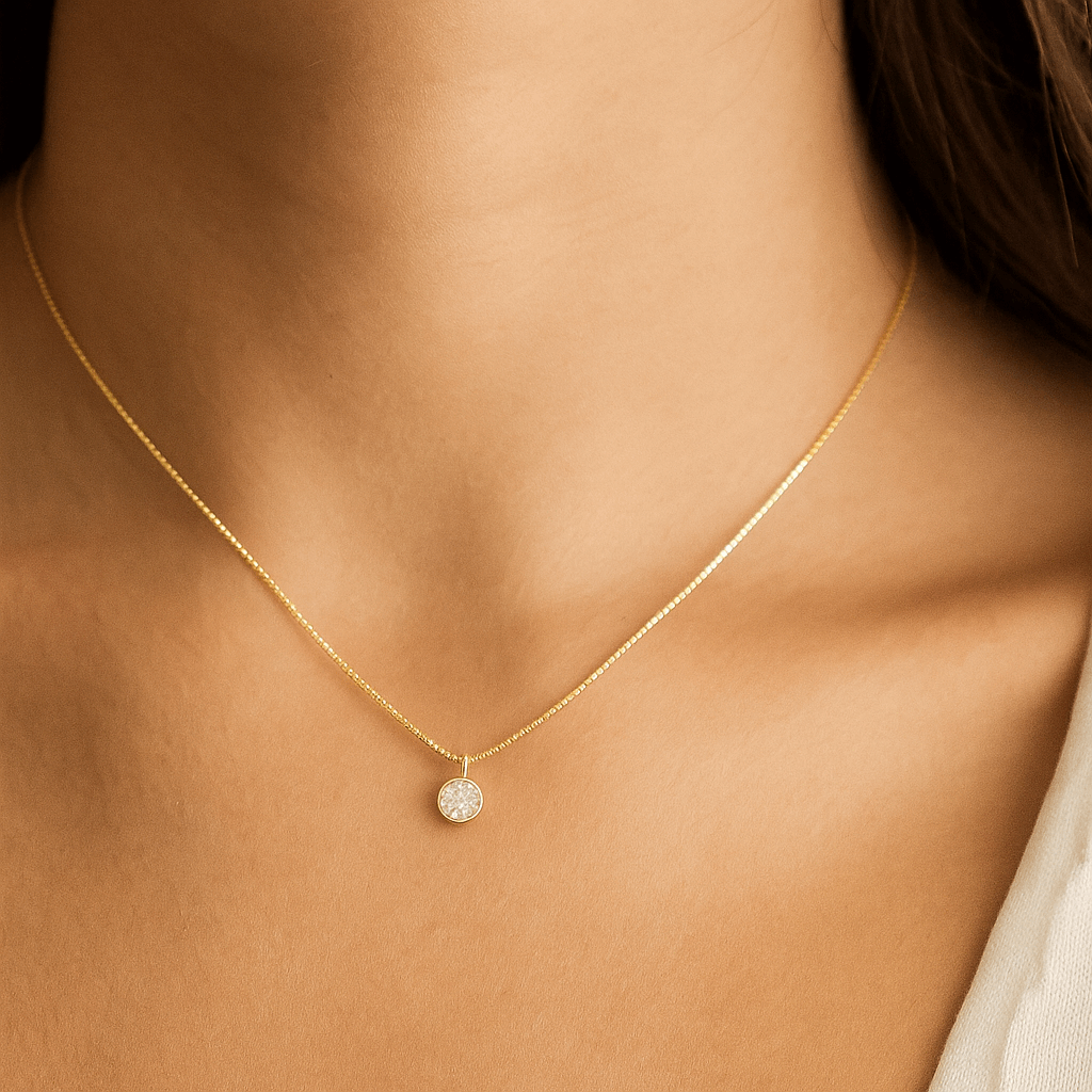 Gold plated chain on a white background