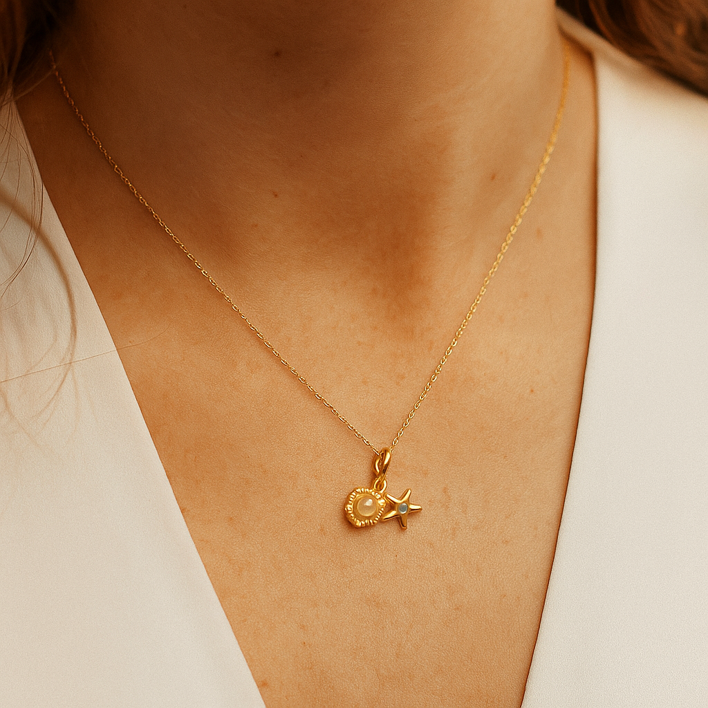 Gold necklace with a Pendant for Women featuring a star on a person's neck