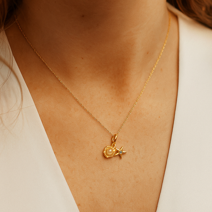 Gold necklace with a Pendant for Women featuring a star on a person's neck