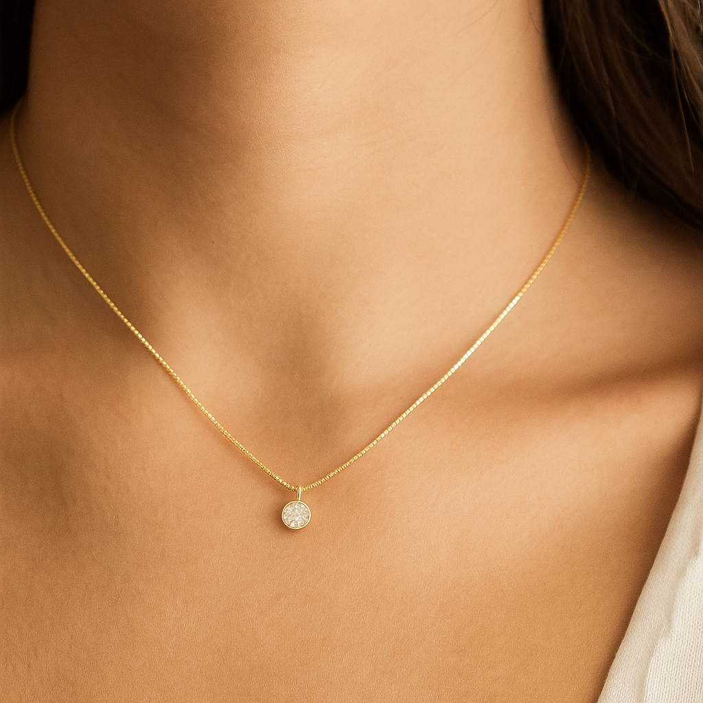 Gold plated chain on a white background