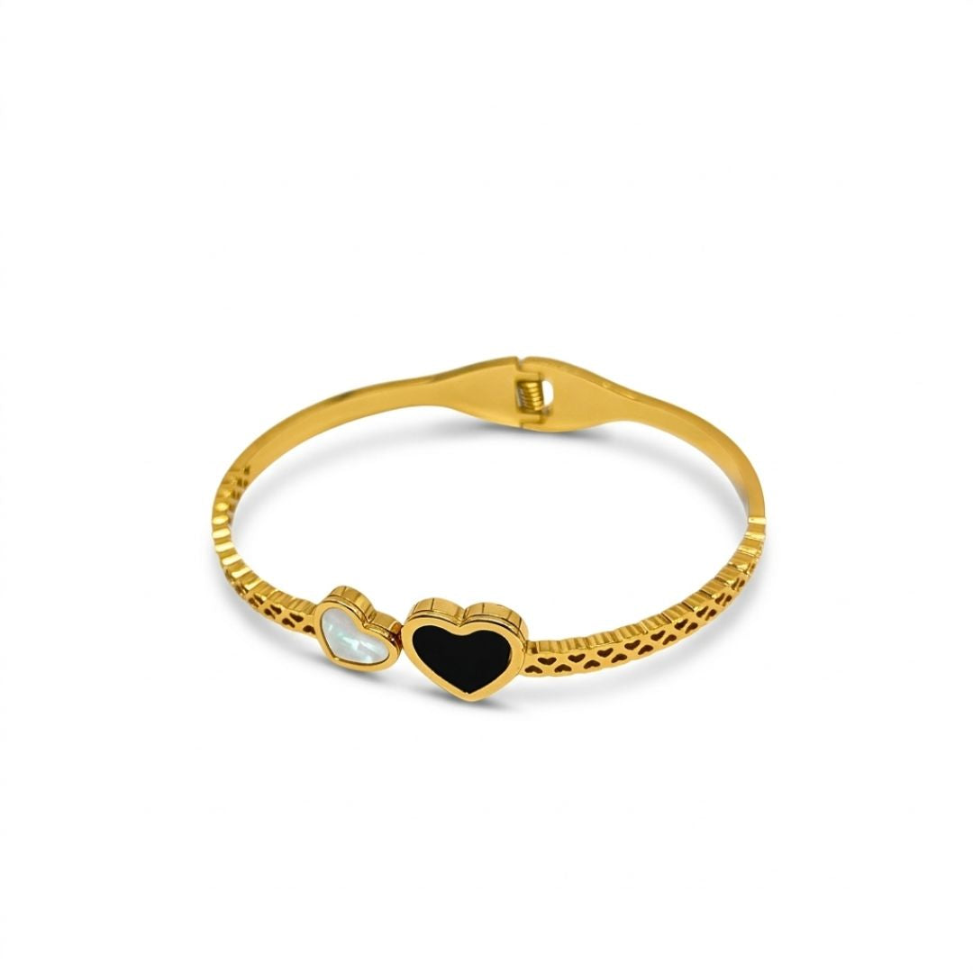 Gold Plated Bracelet for Women with heart-shaped charms on a white background