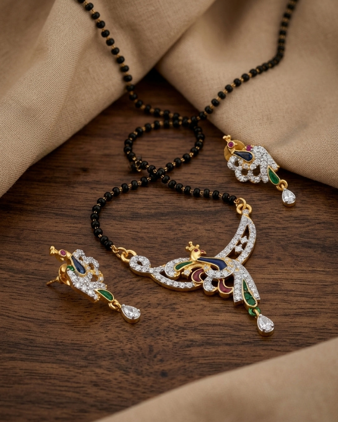 Designer Peacock American Diamond Black Beads Mangalsutra with Matching Earrings