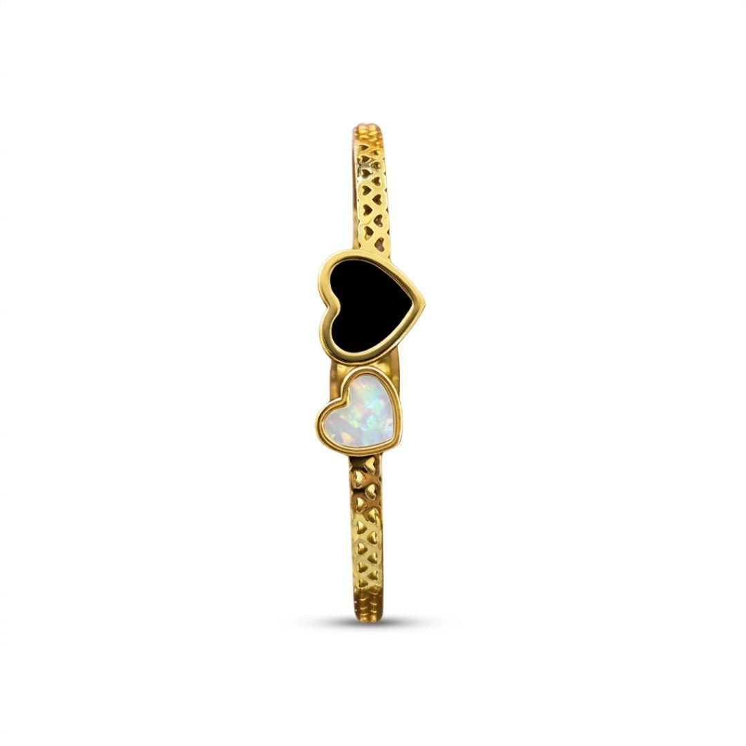 Gold Plated Bracelet for Women wearing a black sports bra and black shorts with white patterns on a white background