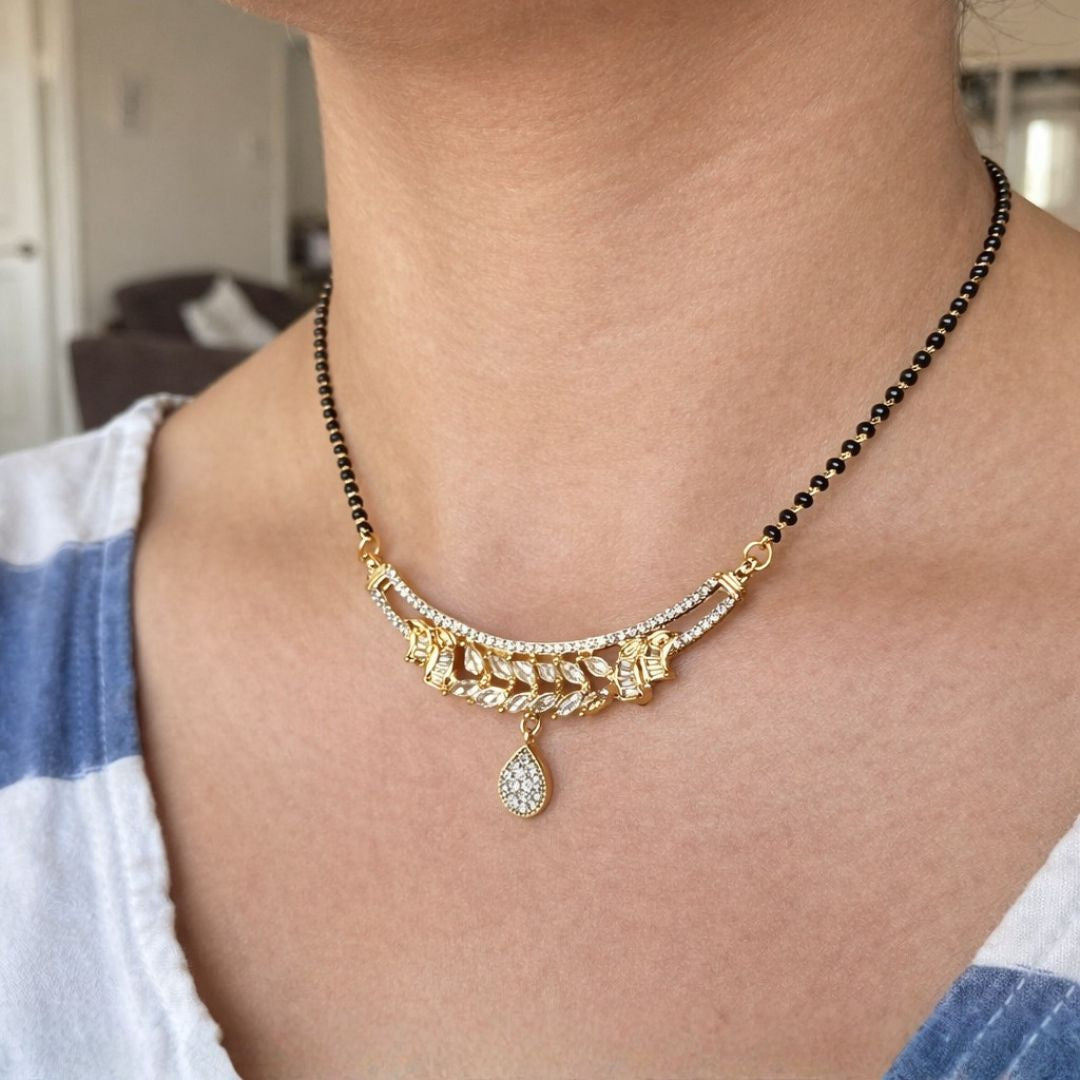 AD angalsutra with Teardrop Pendant and Ornate Detailing