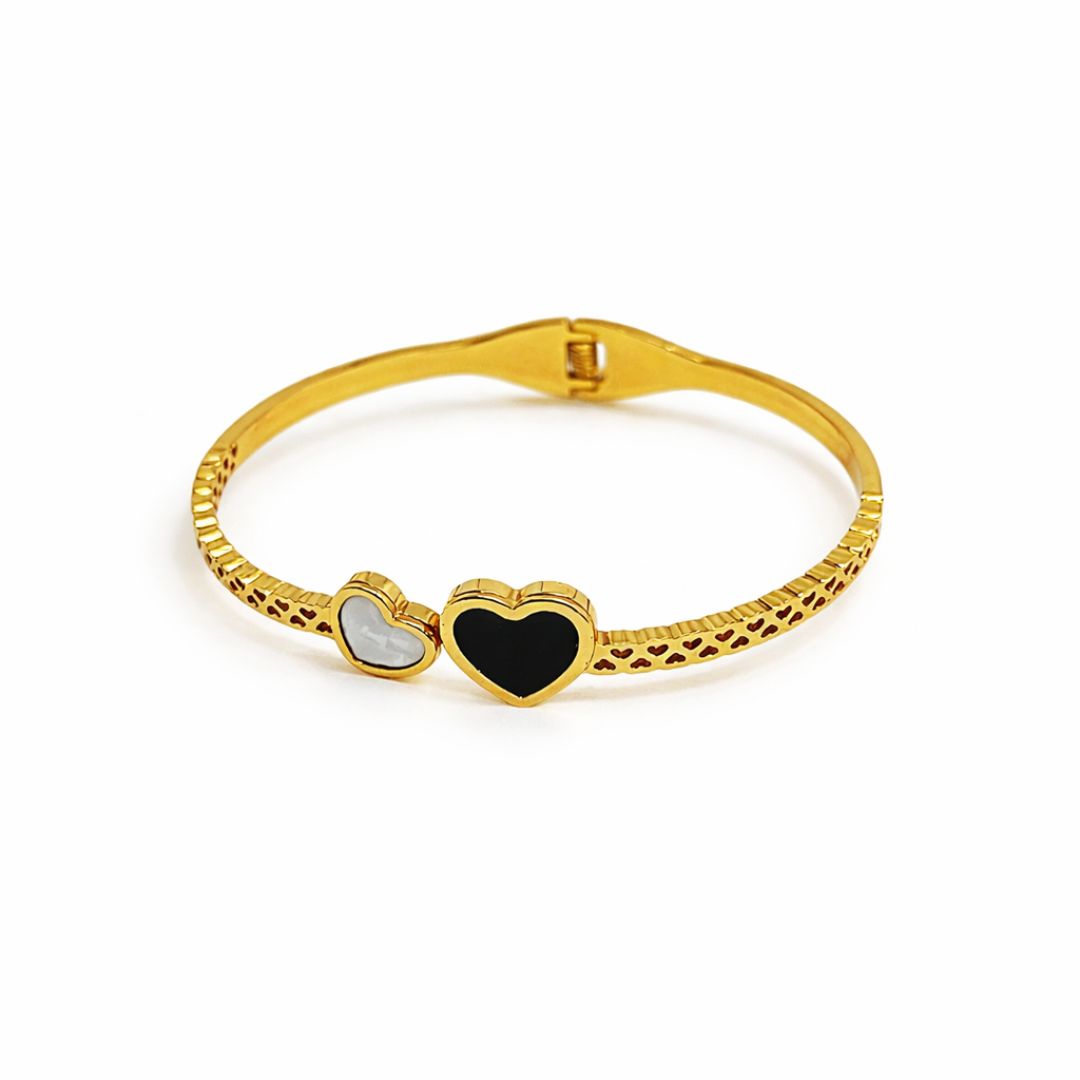 Gold Plated Bracelet for Women with heart-shaped charms on a white background