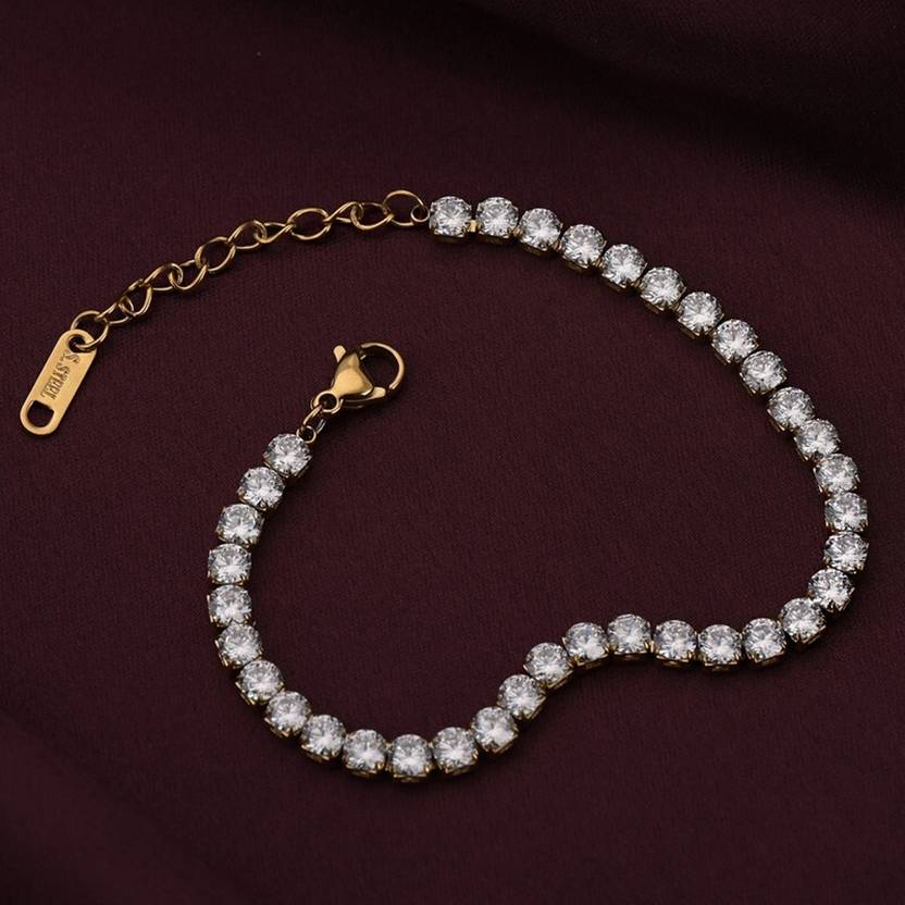 Diamond Bracelet for Women on a reflective surface with a blurred background