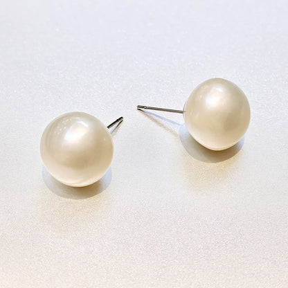 Pearl Earrings for Women on a light gray background