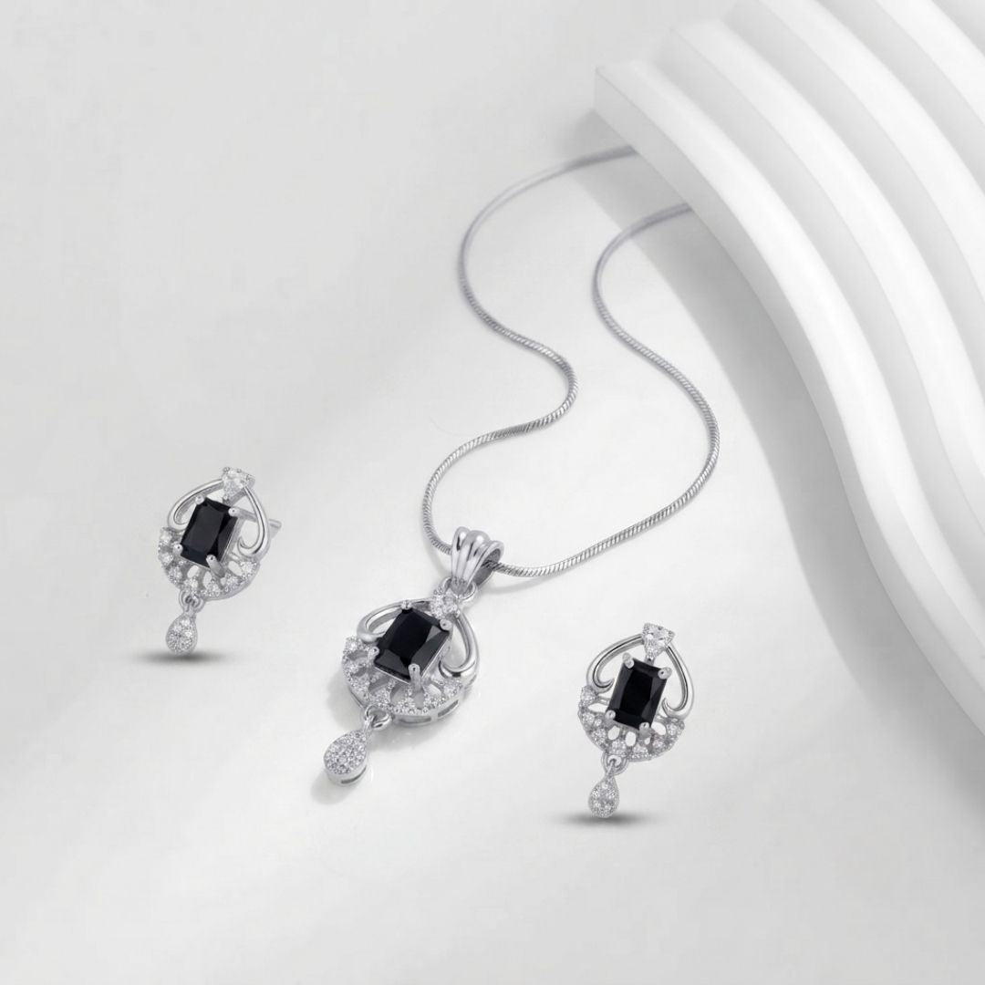 Silver necklace and earring set with rectangular black stones and clear accent crystals