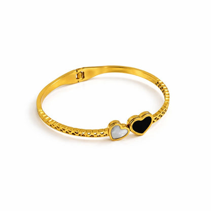 Gold Plated Bracelet for Women with heart-shaped charms on a white background