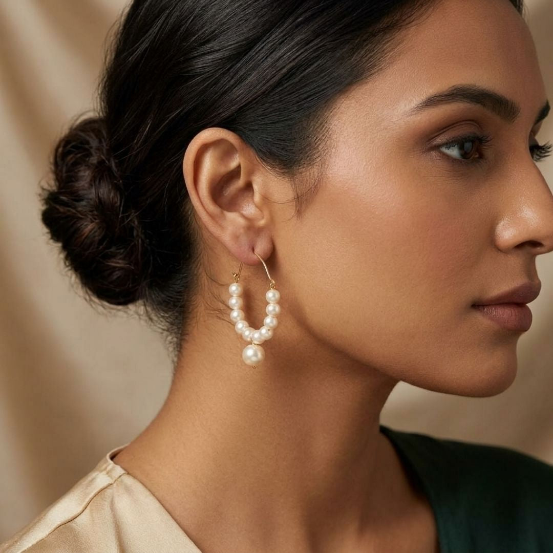 Elegant Pearl Dangle Earrings in Gold Finish