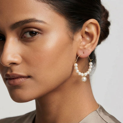 Elegant Pearl Dangle Earrings in Gold Finish