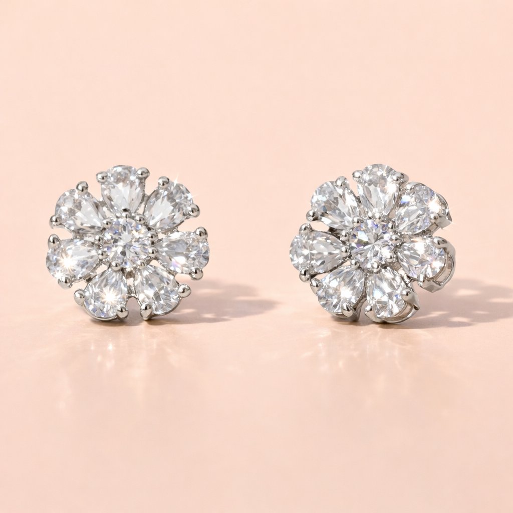 Pair of diamond AD Earrings for Women on a light pink background