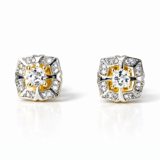 Pair of gold and silver AD Earrings for Women with clear gemstones on a white background