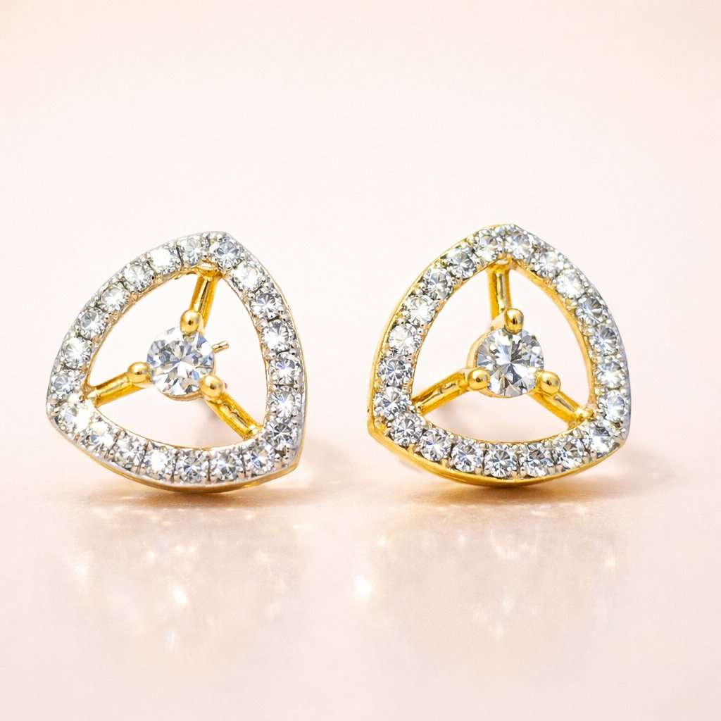 Gold and diamond AD Earrings for Women on a light pink background