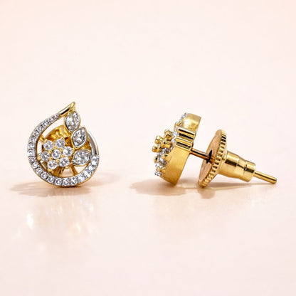 Gold AD Earrings for Women with diamond accents on a light pink background
