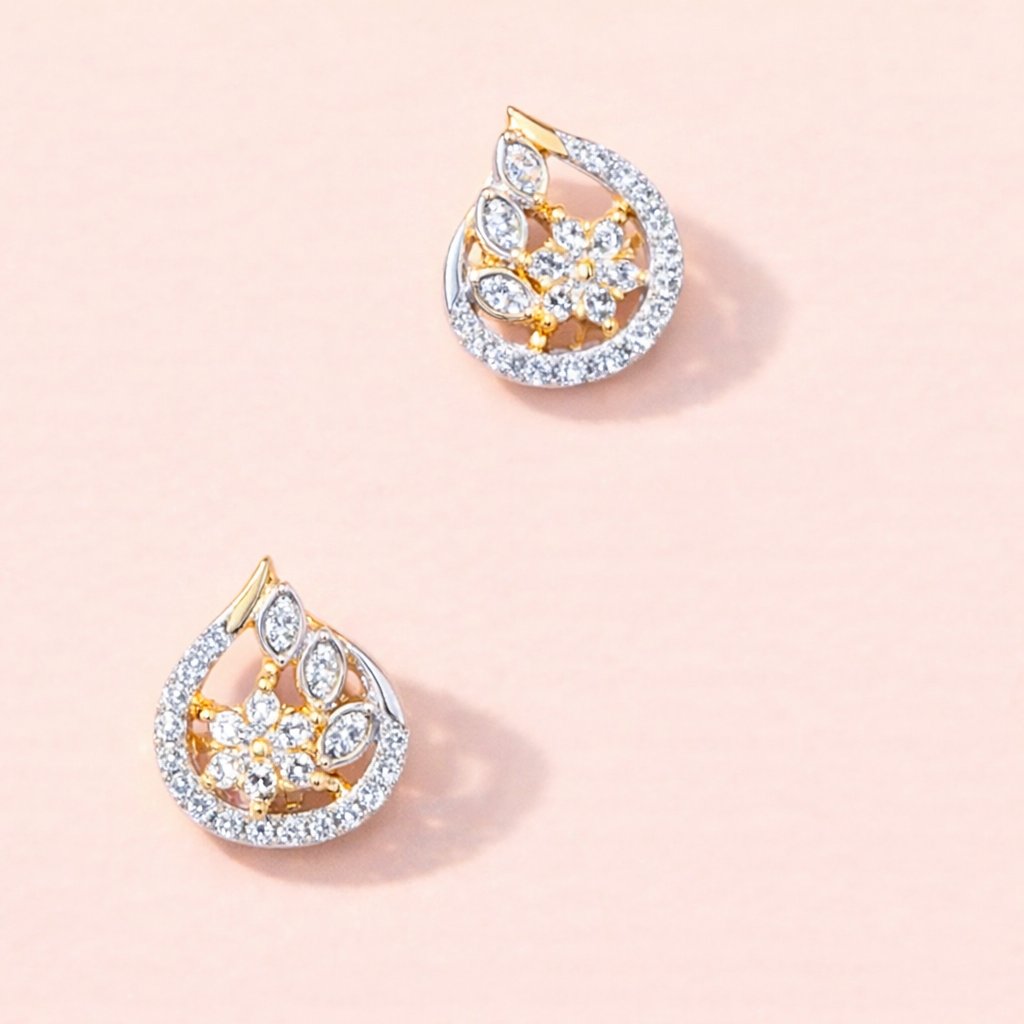 Gold AD Earrings for Women with diamond accents on a beige background